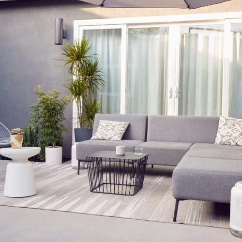 Outdoor Seating And Garden Furniture On Patio Of Contemporary Home Outdoor Seating And Garden Furniture On Patio Of Contemporary Home